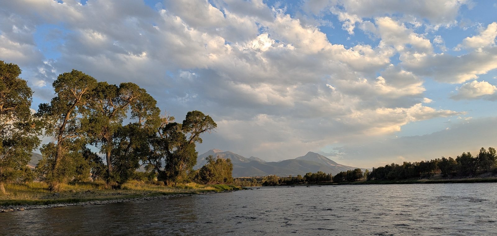 Yellowstone River in Paradise Valley with Chico Mountain and evening clouds
